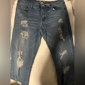 Blue denim distressed skinny jeans